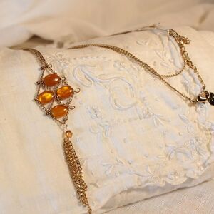 Vintage Liz Clairborne gold-tone lariat necklace with amber orange stones